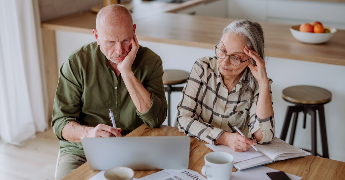 senior couple stressing about budget