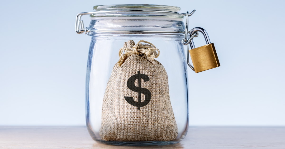 glass jar with locked money bag symbolizing financial security