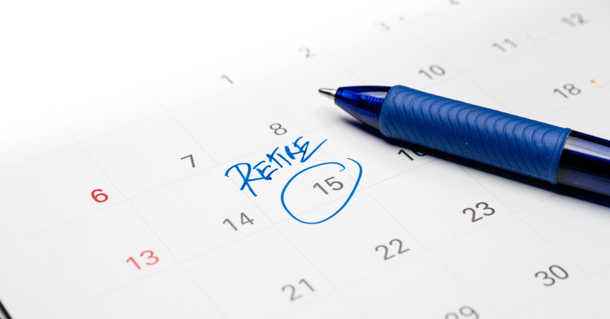 retirement word on white calender with blue pen