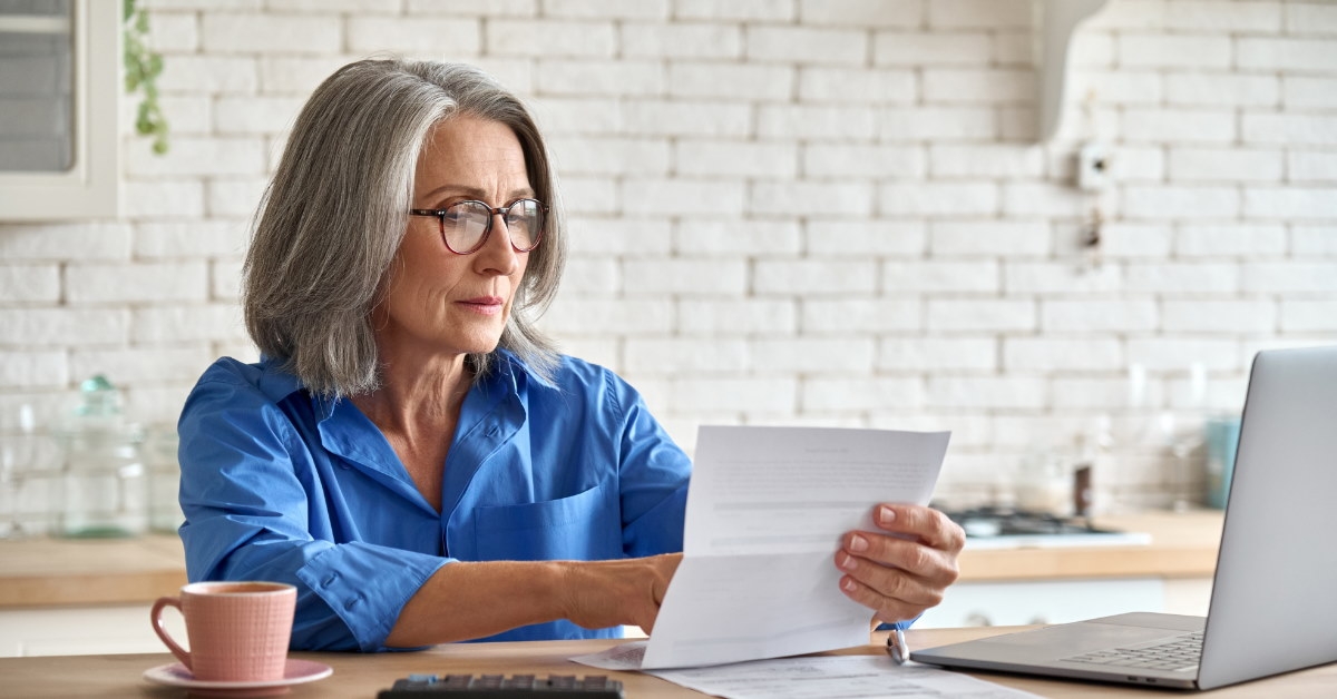senior woman reviewing documents