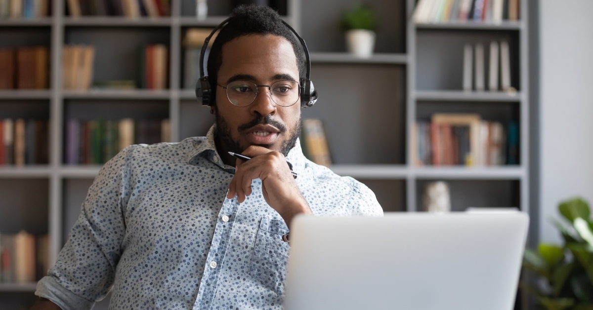 guy in glasses wearing wireless headset