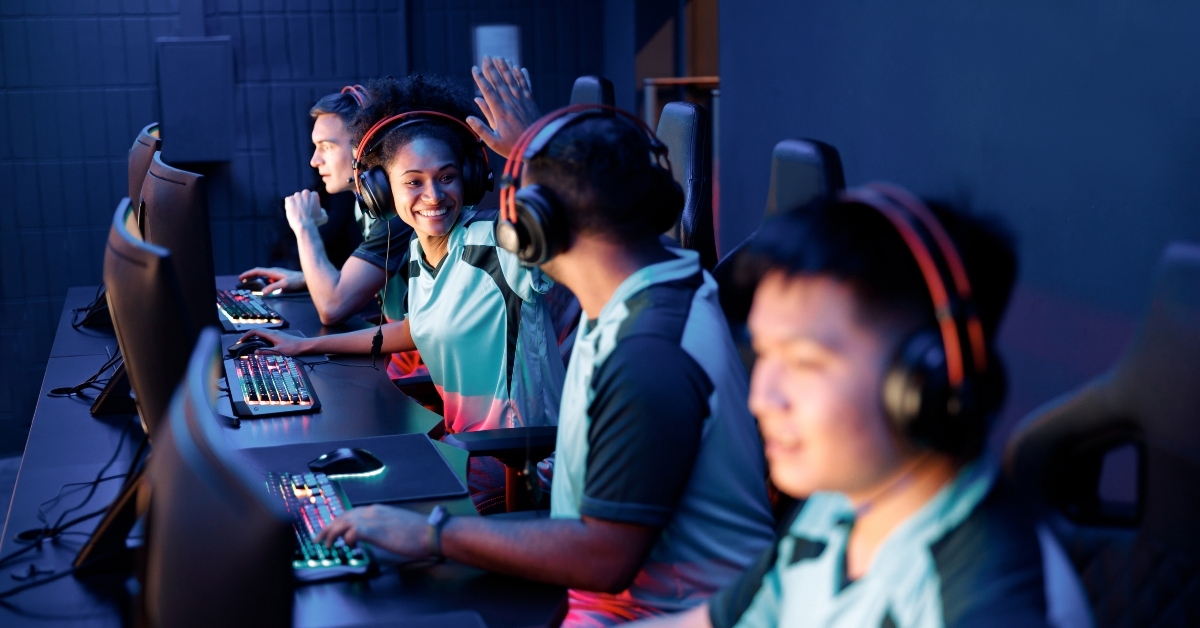 two happy esports team members celebrating success 