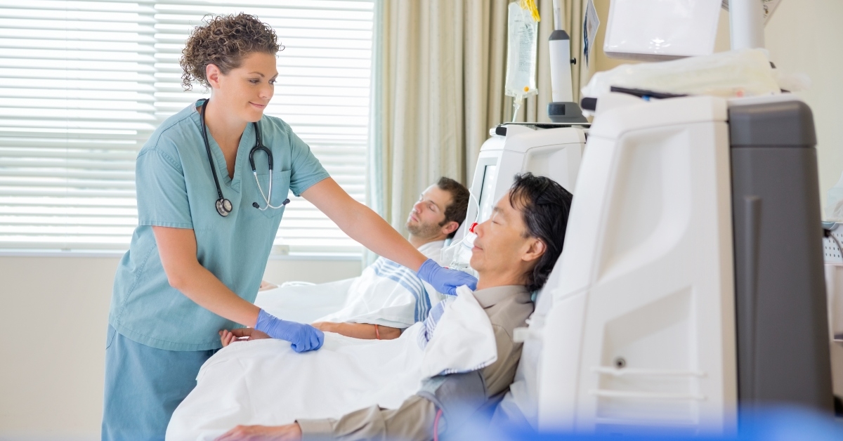 nurse assisting patient undergoing renal dialysis