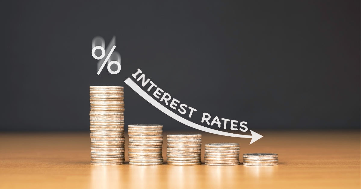 stacked us quarter coins on wooden table