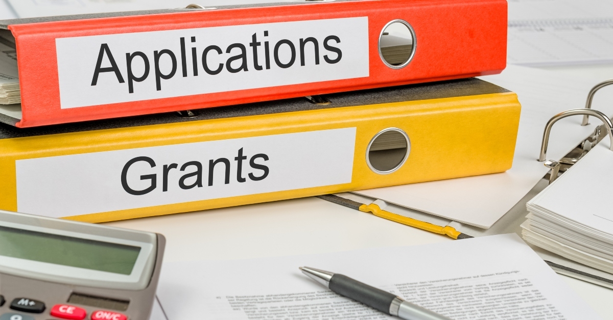 folders with the label applications and grants