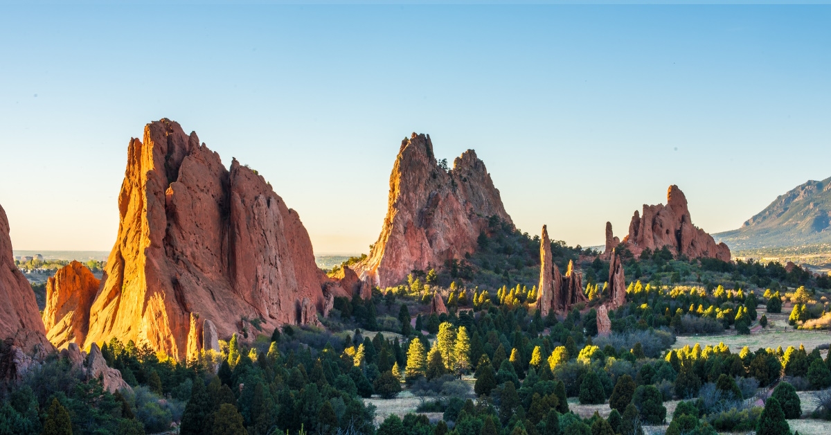 colorado springs mountains and greenery with sun rise