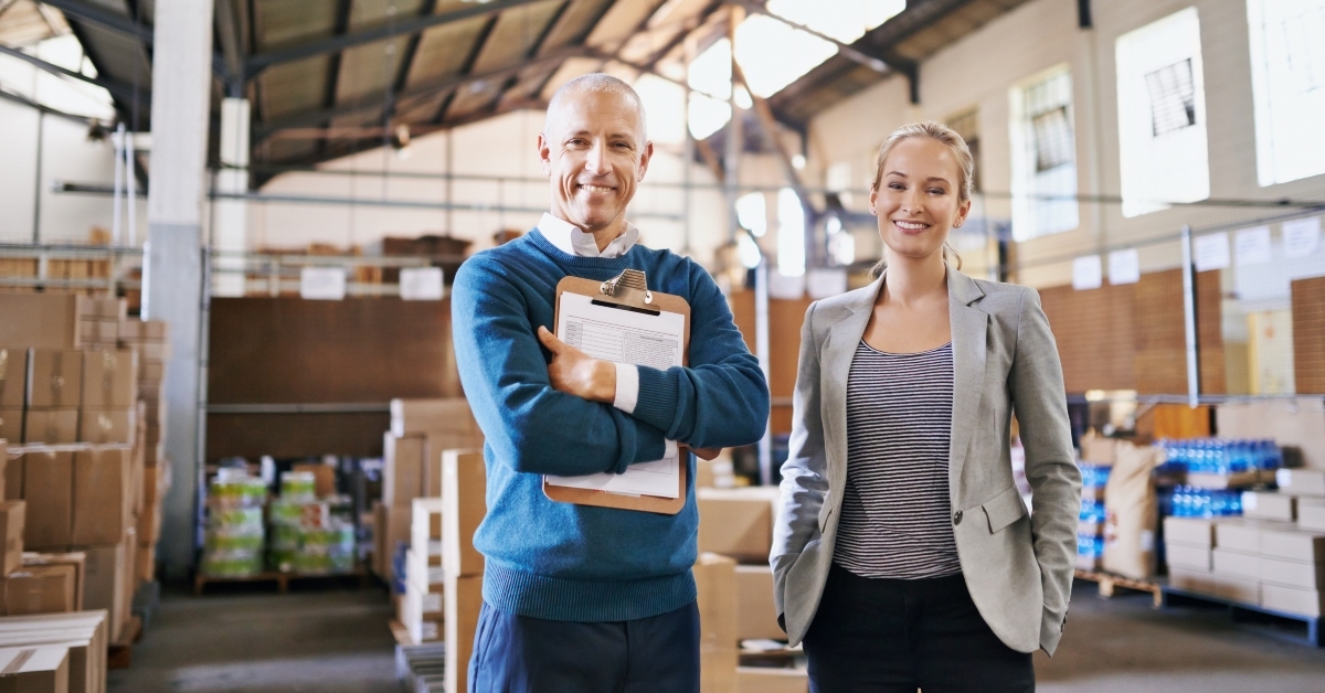 two managers standing in a distribution warehouse