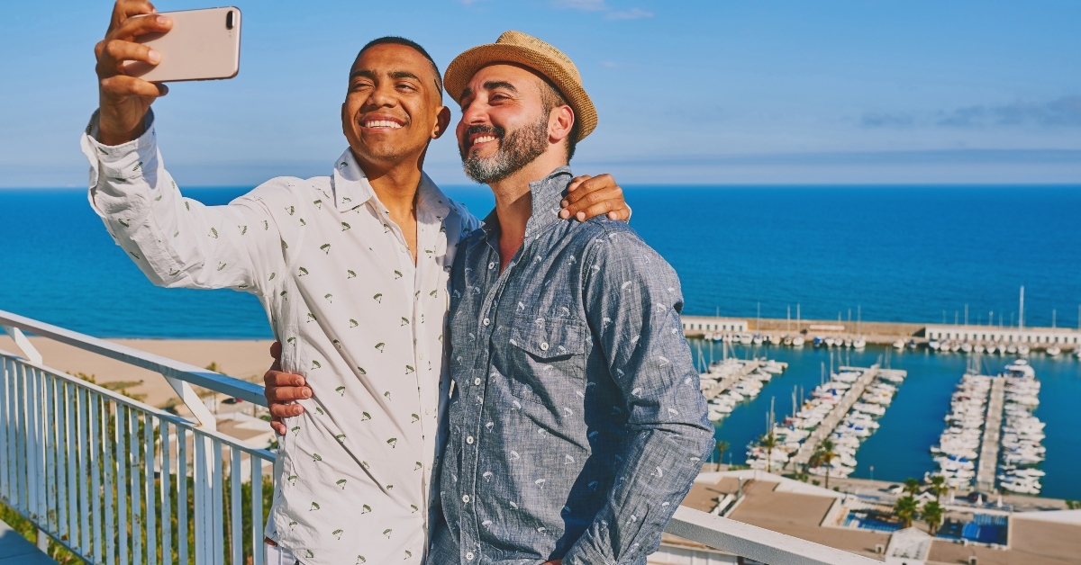 a gay couple using a mobile phone