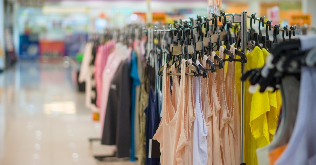 woman top wearclothes on stands in mall