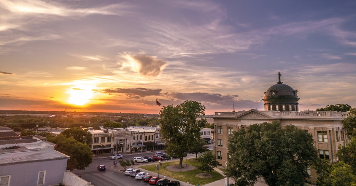 georgetown courthouse with cars and streets during day time 