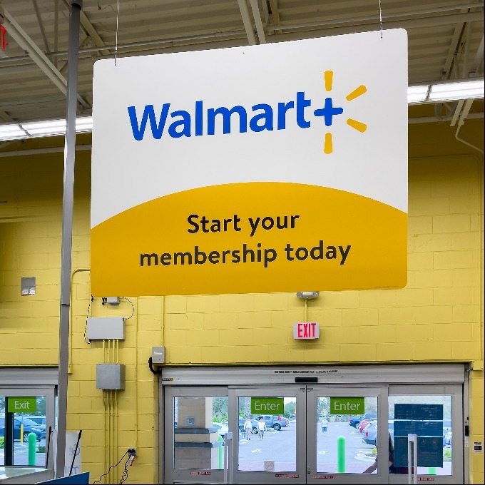 Walmart + membership in store sign