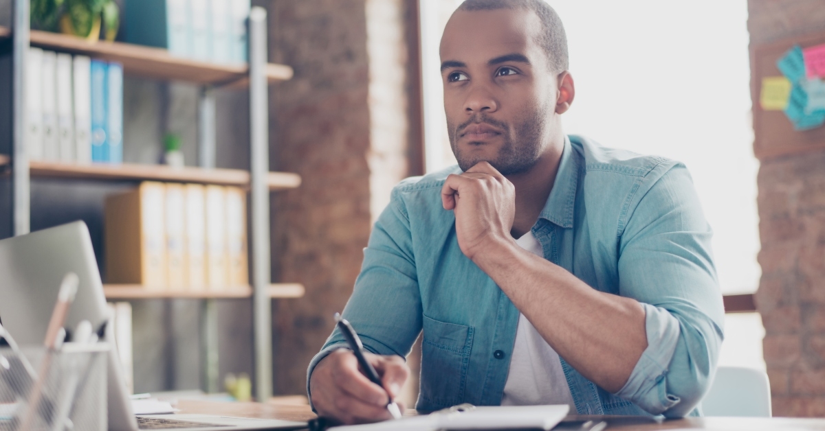 student is making decision sitting at the office 