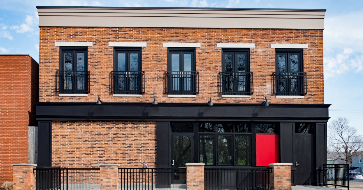 brick commercial building with black accents