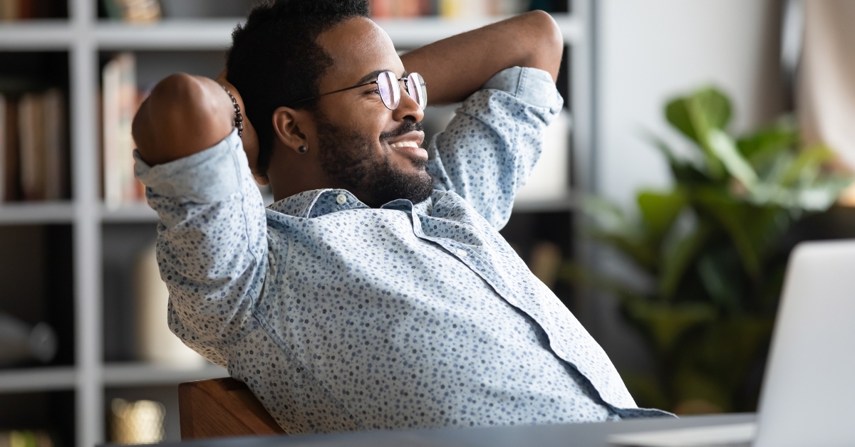 calm businessman resting sit at office desk