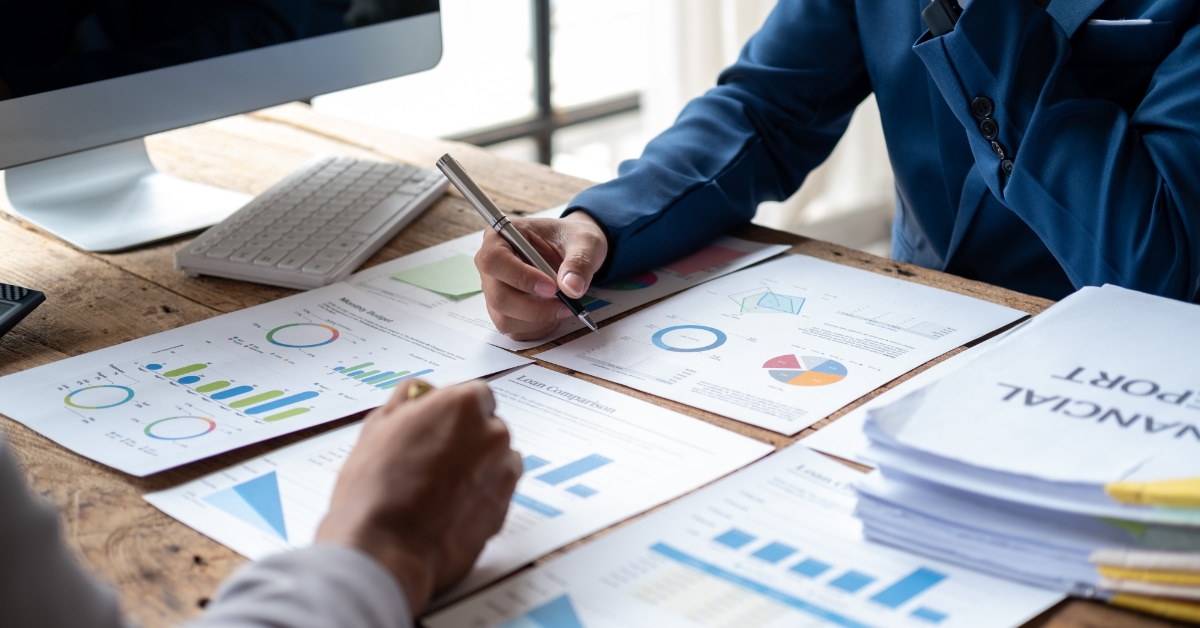 colleagues discussing financial reports