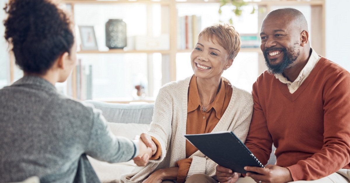 african american female lawyer consulting couple