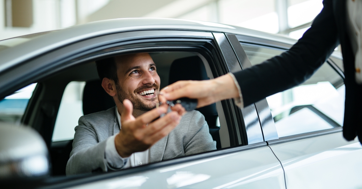 happy customer buying new car