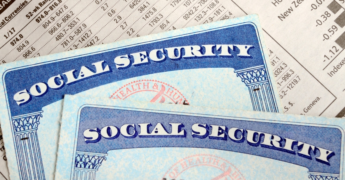 social security bonds placed over global stock market page on newspaper