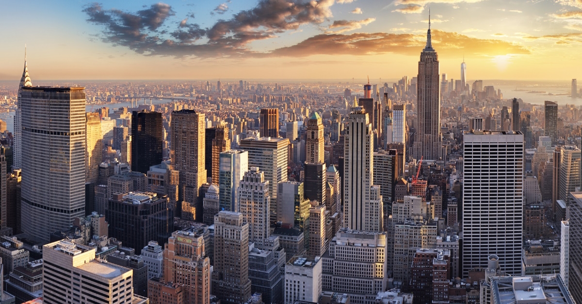 tall skyscrapers in new york city with cloudy sky during day time