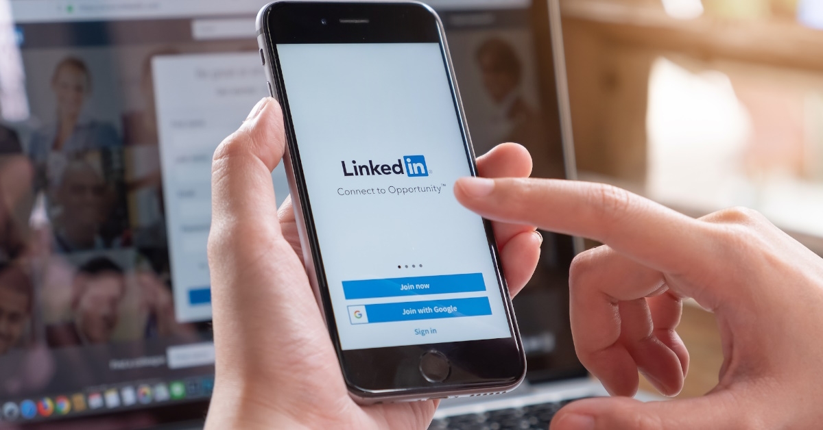 man using linkedIn smartphone.