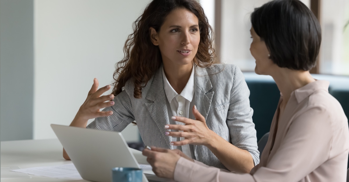 two business woman discussing a project 