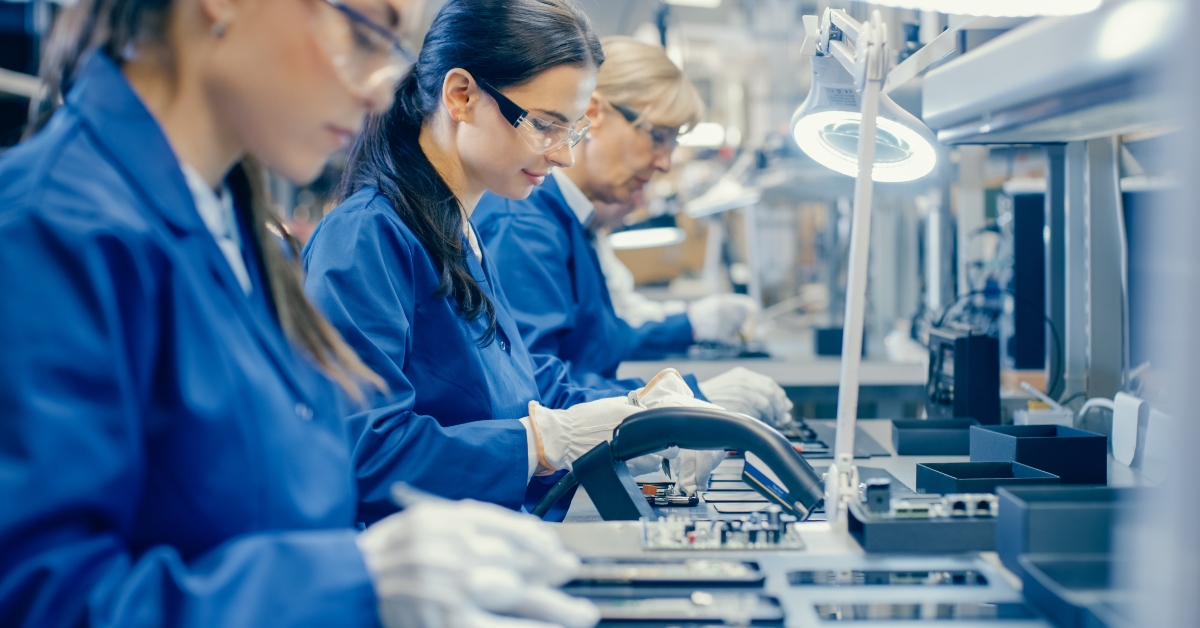 women working in electronics factory