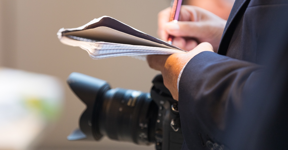 journalist taking down notes
