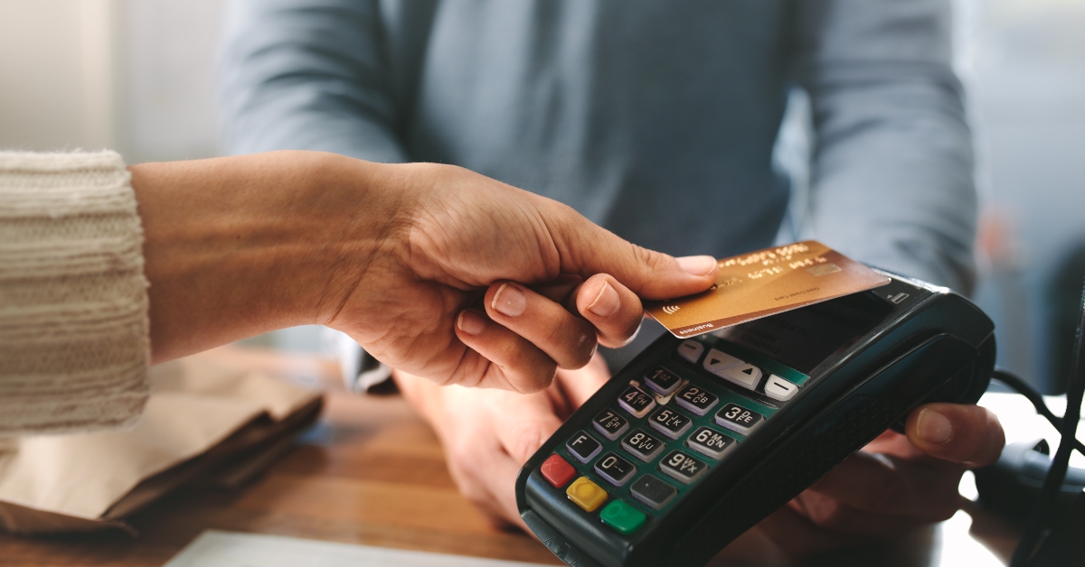 pharmacist accepting credit card 