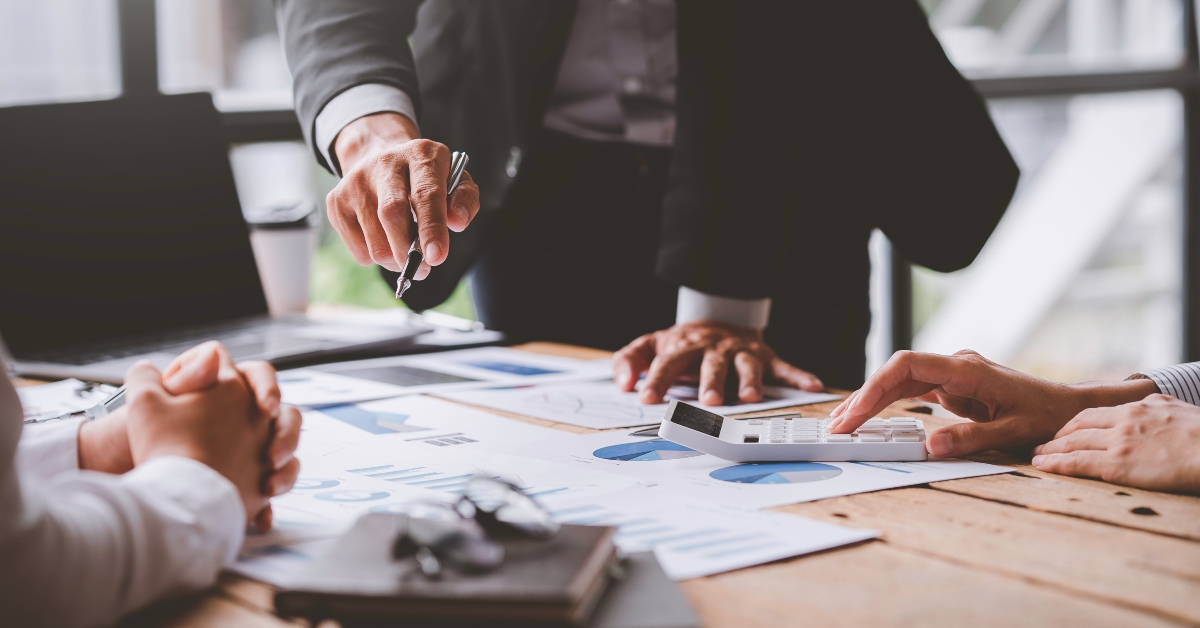 startup business team meeting working on graph document