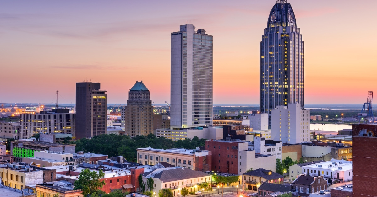 beautiful alabama skyline with golden lights and traffic at midnight