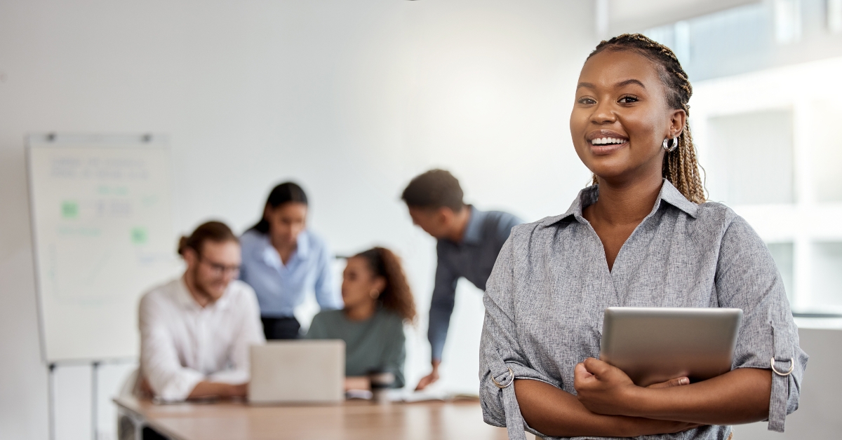 boardroom and portrait of a black woman with a tablet for training