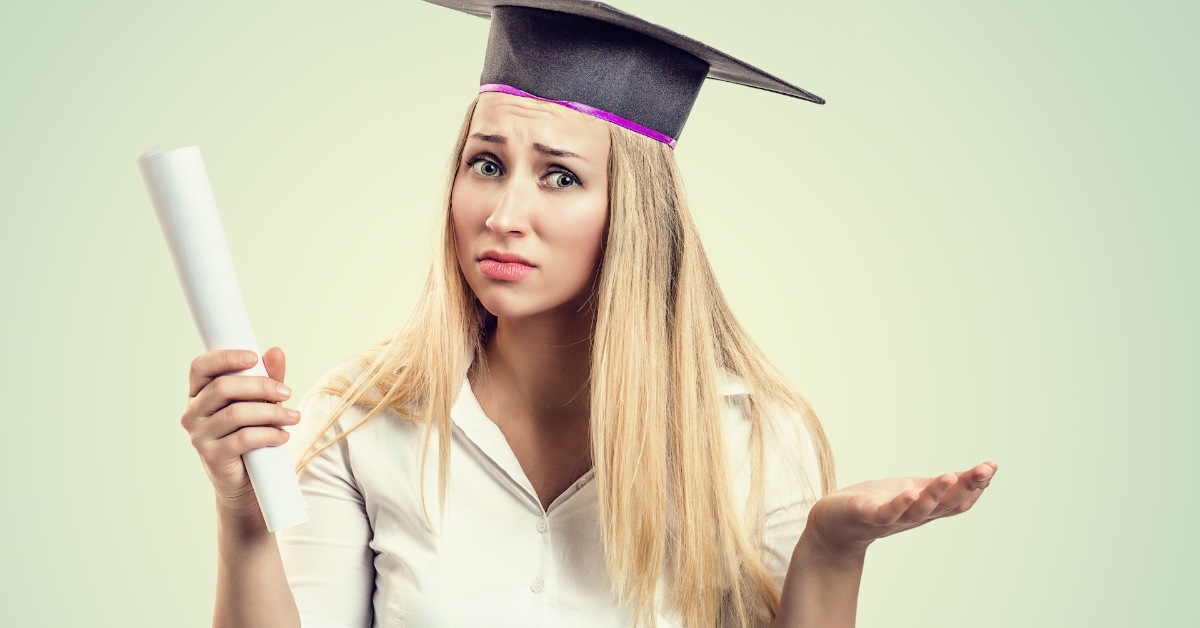 woman wearing graduation hat and holding degree confused 