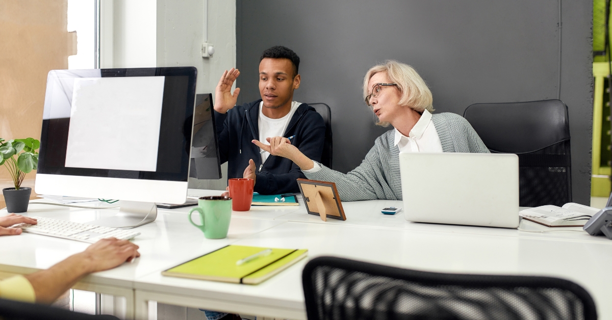female worker teaching new employee