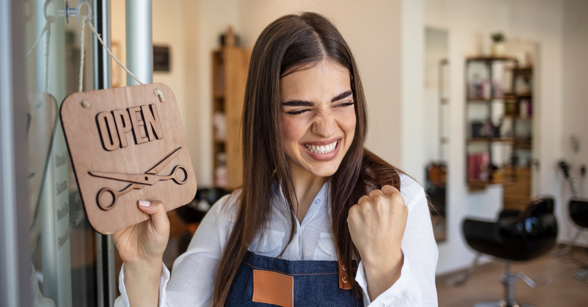 young woman opening a beauty store