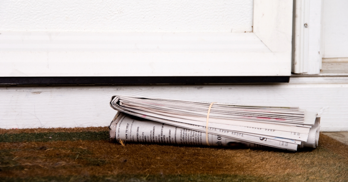 freshly delivered Sunday morning early edition newspaper