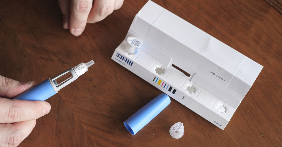 man preparing  semaglutide ozempic injection to control blood sugar levels