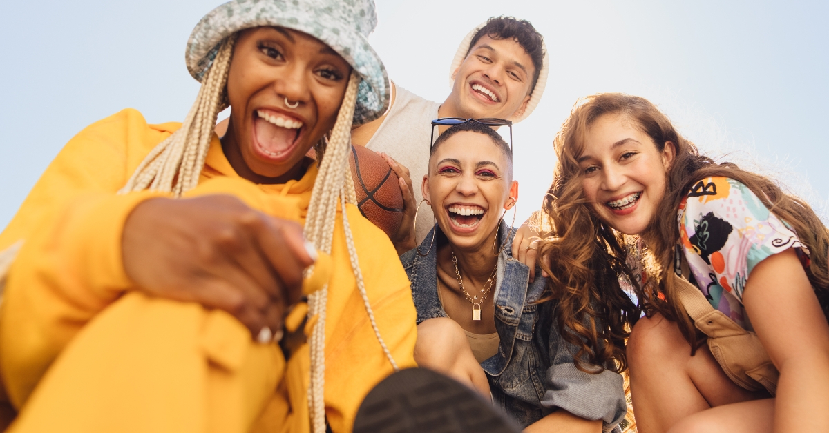 cheerful gen z friends having fun together