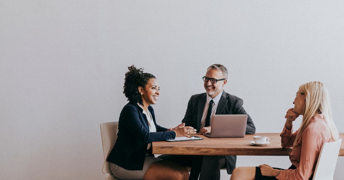 a group of mature business people sitting and finding solutions of  problem.