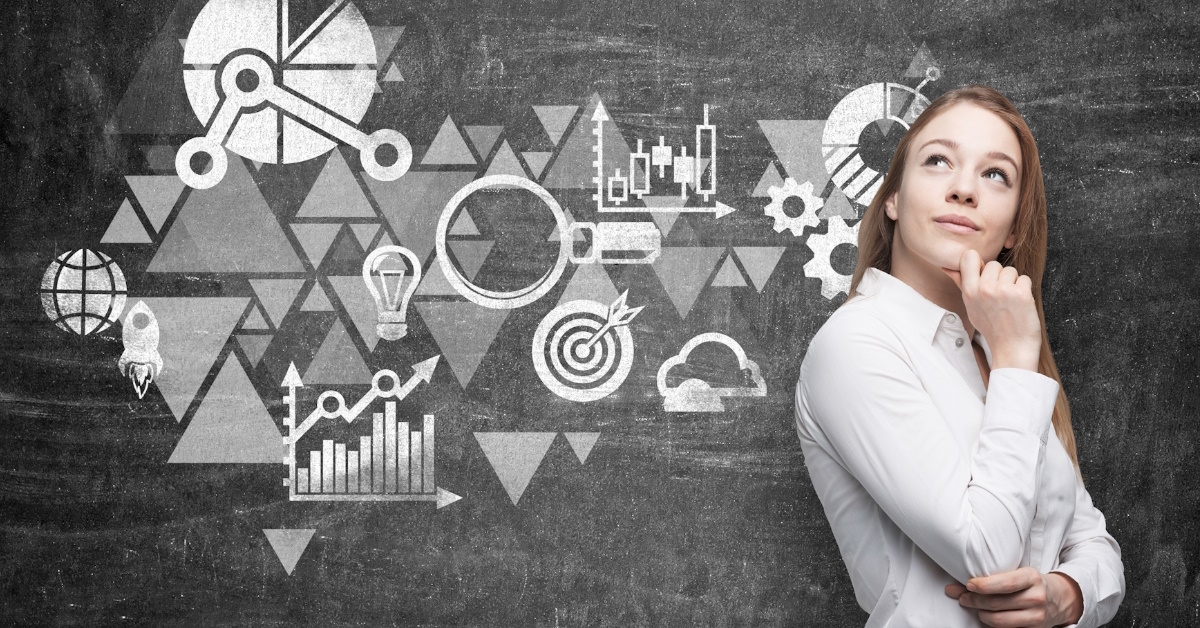 a young businesswoman deep in thought as she considers a business optimization scheme with a black chalkboard in the background.