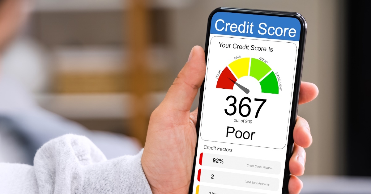 The mobile screen displays a calibrated scale for calculating credit score, with a needle pointing to a low score labeled as poor.