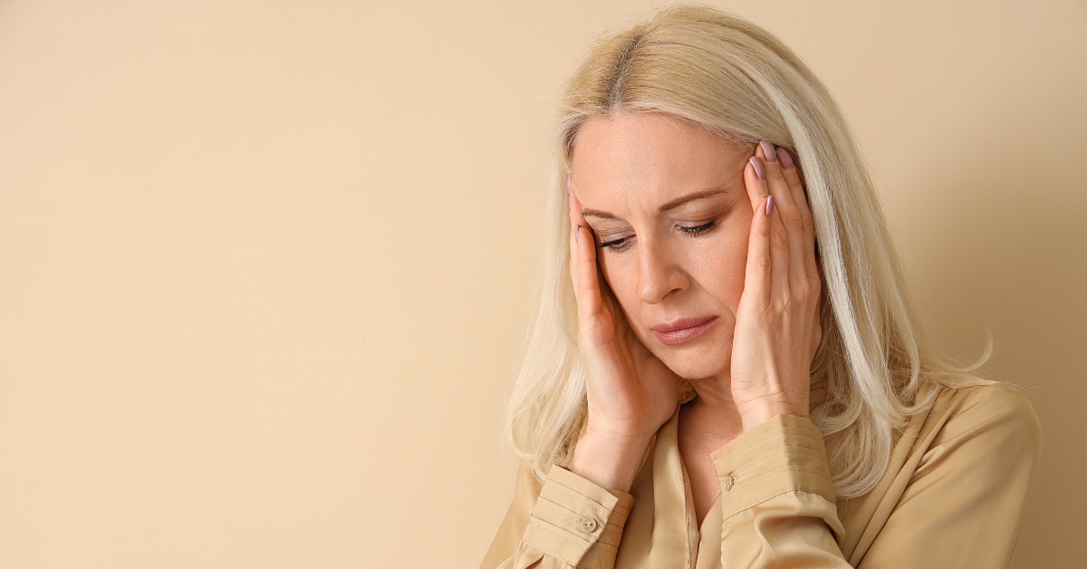 mature woman with headache