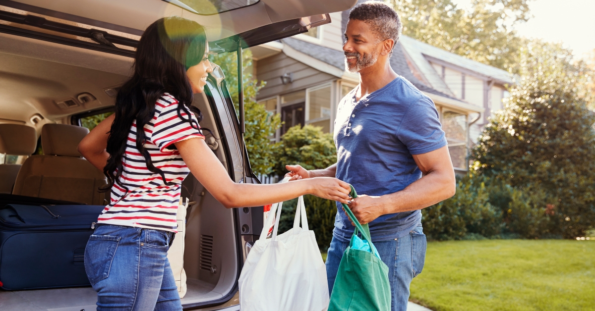 couple unloading shopping bags