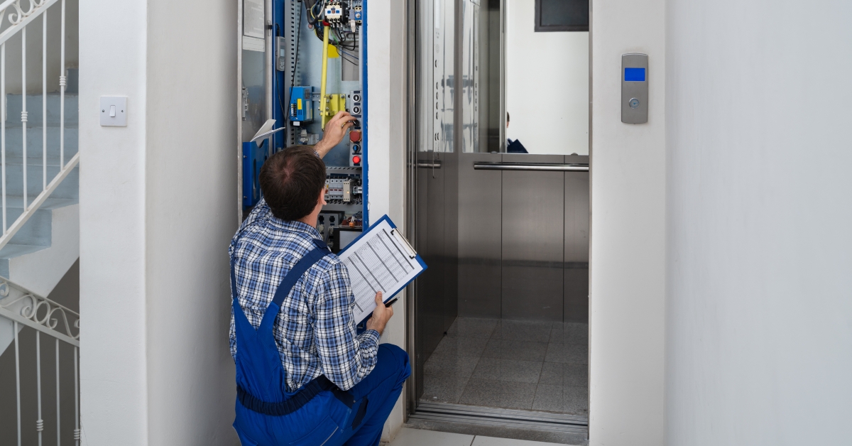 technician repairing elevator
