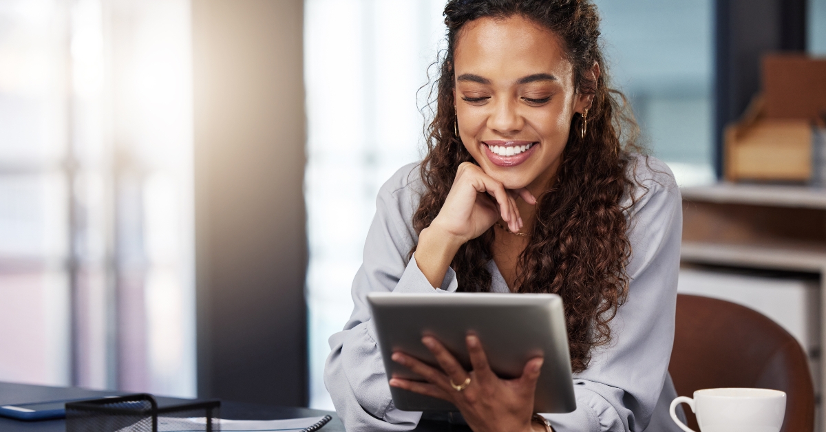 woman holding a digital tablet