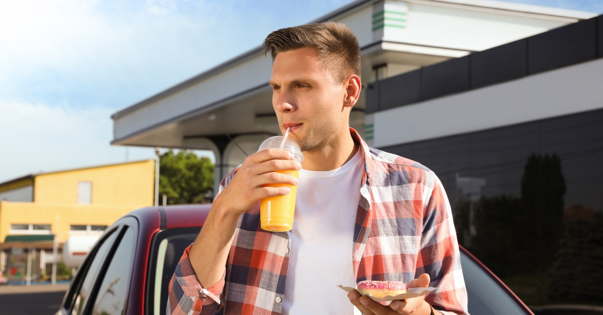 Young man with a drink 