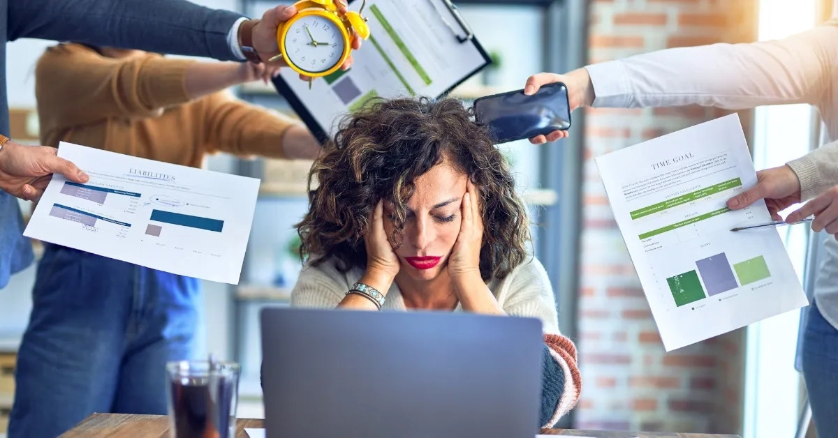 coworkers are troubling a fellow colleague.