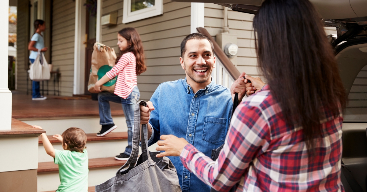 Unloading shopping bags from car