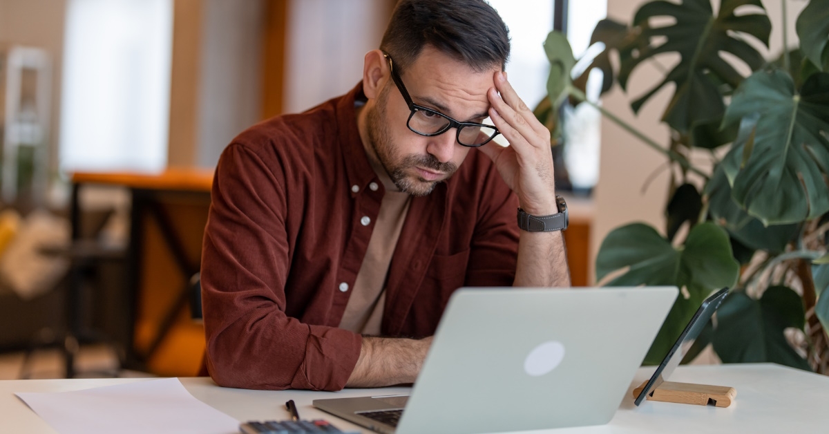 Frustrated person at computer