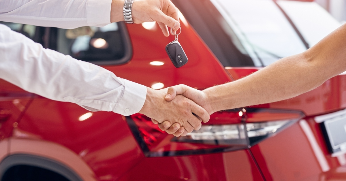 dealer with car keys