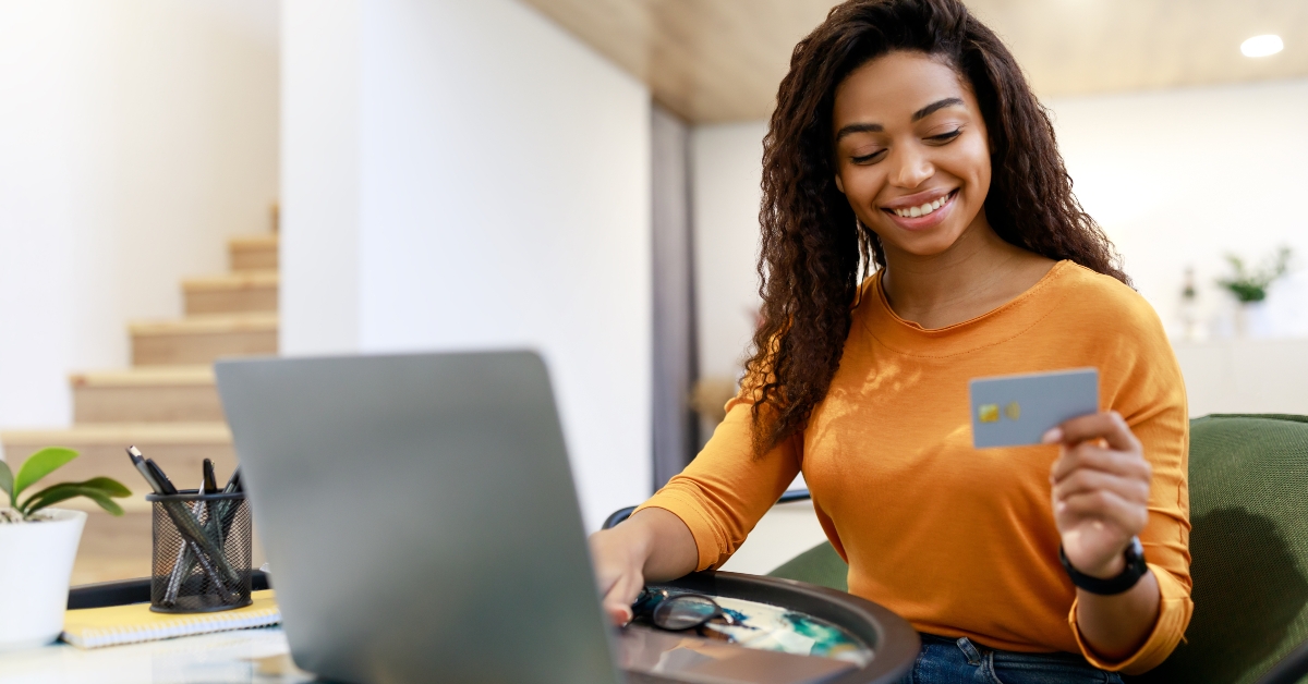 Woman holding credit card
